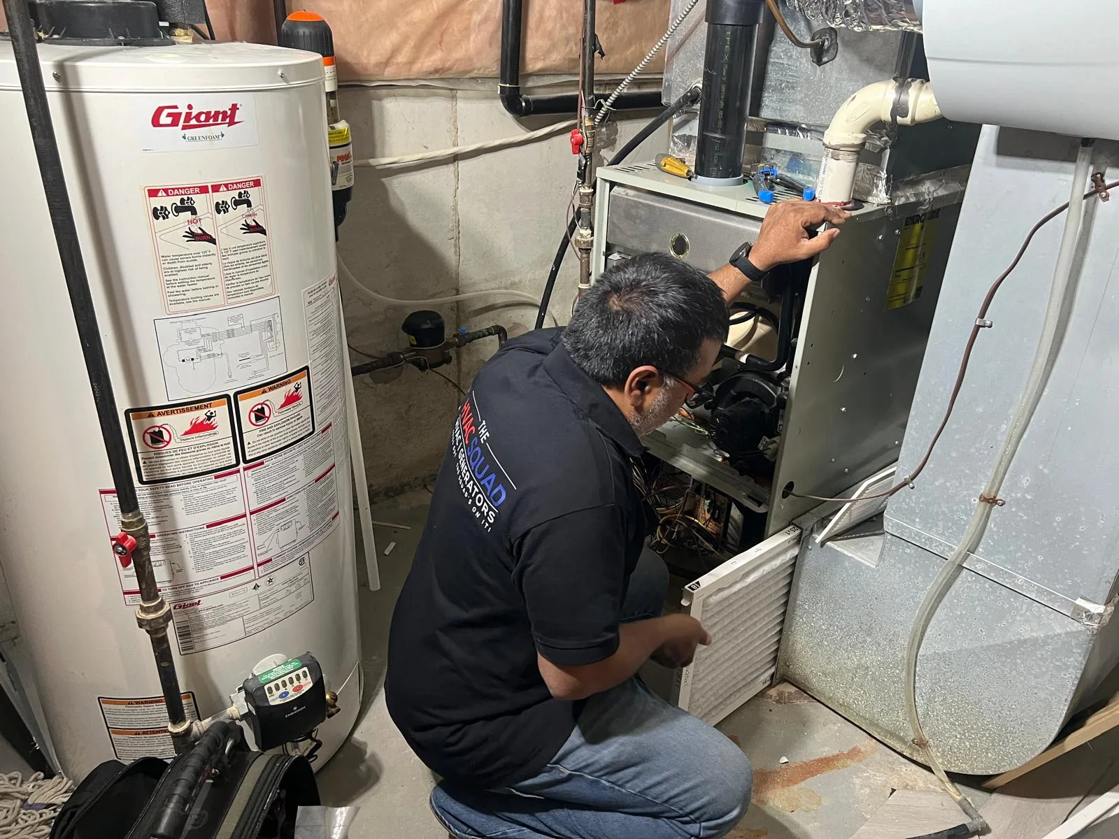 The HVAC Squad team completing a residential furnace installation